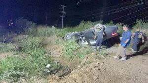 Speeding Chinese Driver Crashes Into Construction Road Barrier and Overturns Mercedes Near Pattaya, Injures Road Worker, Himself, and Passenger