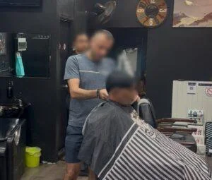 Chonburi Immigration Officers Raid Pattaya Barbershops, Arrest Pakistani and Turkish Man for Illegal Work