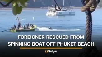 Thai fishermen rescue foreigner as unmanned boat spins off Phuket beach