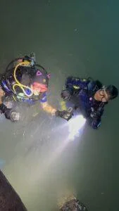 17-Year-Old Thai Boy Overjoyed as Pattaya Rescue Divers Recover Lost Phone from 3-Meter Deep Sea in Pouring Rain