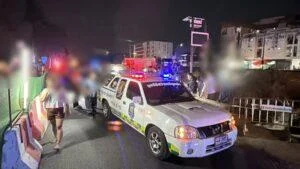 Tragic Motorcycle Collision at Railway Crossing in Pattaya Leaves One Person Dead, Sister in Grief