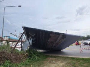 Strong Winds from Thunderstorm Topple Large Billboard in Banglamung