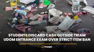 Students discard cash outside Triam Udom entrance exam over strict item ban